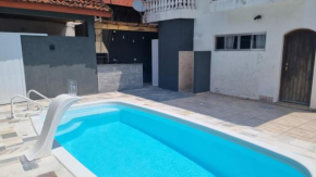 Casarão-piscina-4suites-80 passos da areia